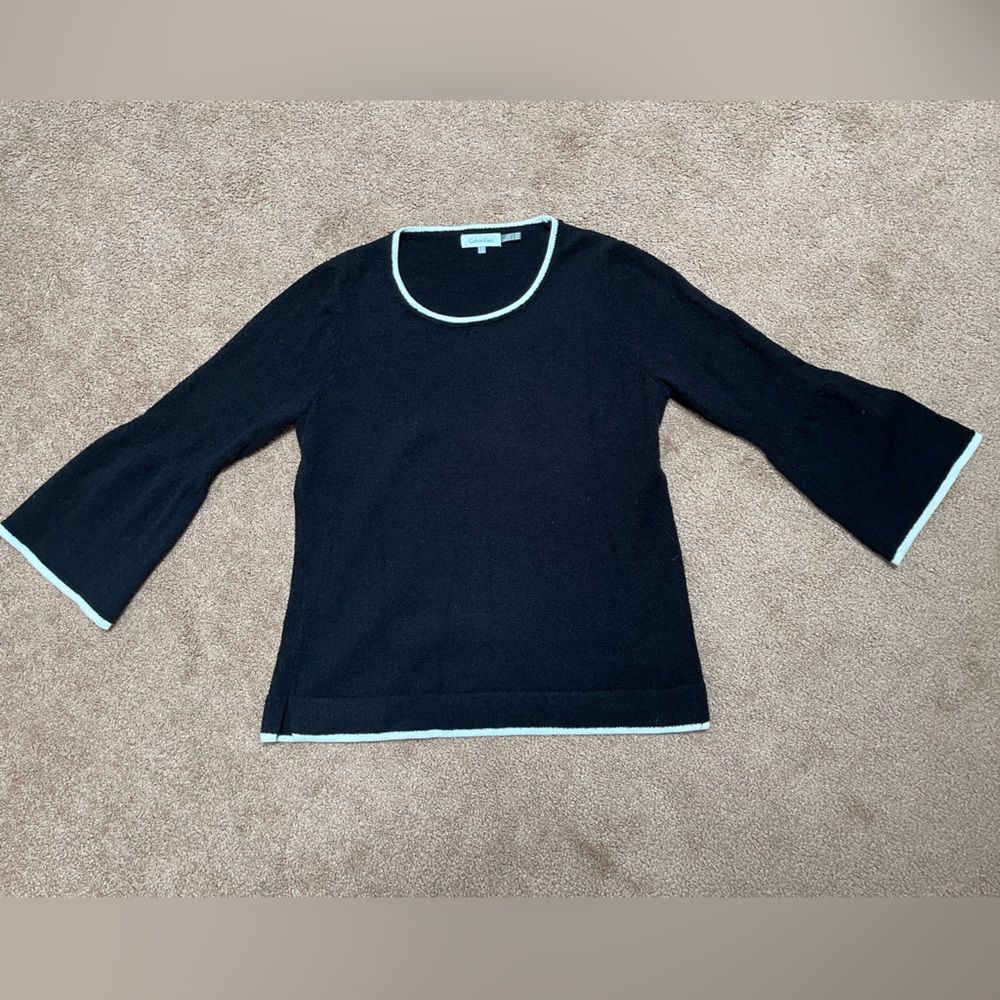 Calvin Klein size large black sweater with white trim